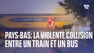 PaysBas les images dune violente collision entre un train et un bus [upl. by Seeto794]