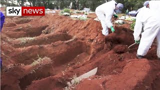 Brazilians dig mass graves as Bolsonaro dismisses COVID19 pandemic as a little flu [upl. by Waxler]