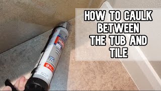 How to caulk between the tub and tile in the bathroom DIY video caulk tub tile [upl. by Norod]