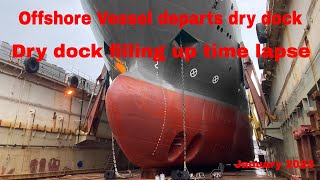 Offshore vessel undocking from floating dry dock Filling up dry dock Time lapse [upl. by Adekam]