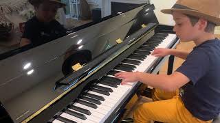 The Entertainer  A fast version played by a 7 yearsold piano prodigy Paul Petrescu [upl. by Annayat]