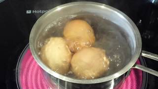 Boiling Three Eggs using an electric cooker [upl. by Ylrebnik]