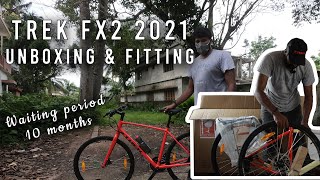 TREK FX 2 HYBRID BIKE UNBOXING AND FITTING [upl. by Dodi249]