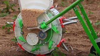 seeders amp transplanters hand manual corn seeder machine planter corn seed planter seeder planter [upl. by Tletski]