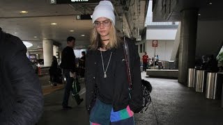 Cara Delevingne Looking Cute In Beanie And Colorful Pants At LAX [upl. by Bensky]