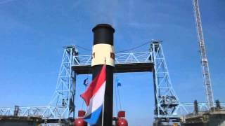 Steam Tug Hercules whistling under the Botlek bridge Rotterdam Holland [upl. by Ehling936]