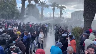 Tunisian police fire water cannons at protesters [upl. by Anertal]