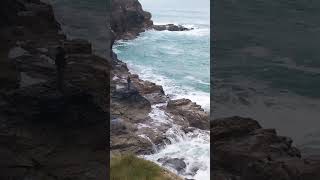 Perranporth Friday morning person fishing battling against Ocean Waves 🌊🌊🌊🌊 [upl. by Marih476]