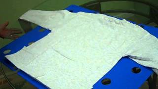 How to Fold a Sweater or Long Sleeve Shirt [upl. by Fonsie943]