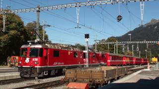 Züge der Rhätische Bahn RhB in Klosters Ferrovia retica Seilbahn Gotschnabahn Eisenbahn Schweiz [upl. by Goat]