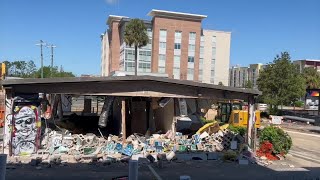 Demolition crew tearing down former All Saints Cafe in Tallahassee [upl. by Netfa]