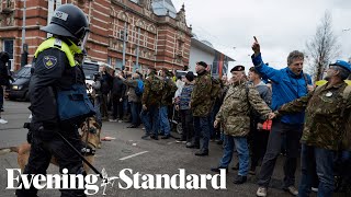 Europe Protests Thousands clash with police in Amsterdam over lockdown measures [upl. by Ozneral]