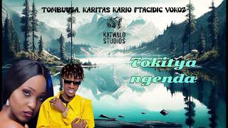 Tombuuza karitas kario ft Acidic Vokoz official lyrics video [upl. by Lleynod300]