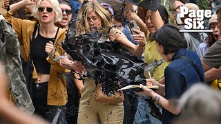 Jennifer Aniston has fake oil thrown on her while filming ‘The Morning Show’ [upl. by Hindu]