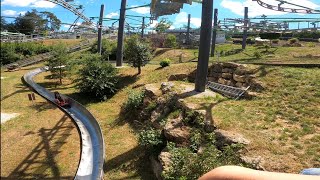 Achterbahnen Hexenbesen hängende Gondeln in fahrt im Freizeitpark Pottenstein Fränkische Schweiz [upl. by Nitas369]