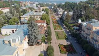 Kislovodsk Russia Kurortny Boulevard with flower beds and people walking Aerial View [upl. by Eintroc]