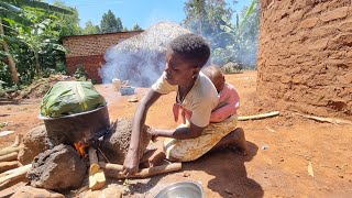 African village extended family harvesting fresh banana from garden Cooking groundnuts with banana [upl. by Younglove784]