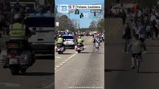 RideAlong Louisiana Boy Cruises Alongside Cop in Mardi Gras Parade [upl. by Alomeda]