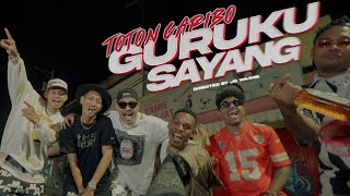 TOTON CARIBO  GURUKU SAYANG Official Music Video [upl. by Akitnahs]