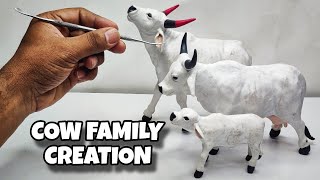 Sculpting clay Making Cow Family with clay  Clay Animals Art [upl. by Wedurn129]