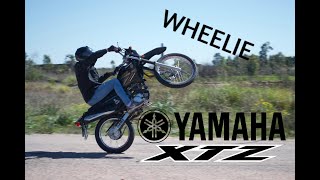 WHEELIES YAMAHA XTZ 125 [upl. by Soisatsana538]