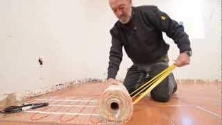 Plancher chauffant électrique sous un parquet collé  Bricolage avec Robert [upl. by Kilah]