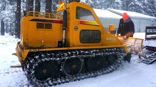 Plowing Deep Snow In a Blizzard With a Bombardier Tank [upl. by Wernda575]