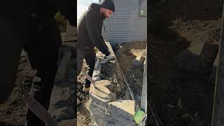 Completing a Blue Stone retaining wall canberra stonemason masonry landscaping [upl. by Naujet]