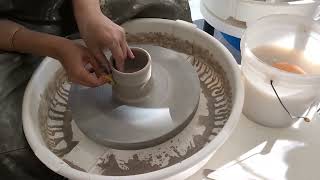 Throwing a bowl on a pottery wheel [upl. by Lelia]