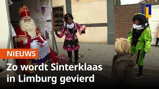 Sinterklaas in Limburg Pieten aan de deur en met Sint achterin de aanhangwagen [upl. by Brenna]