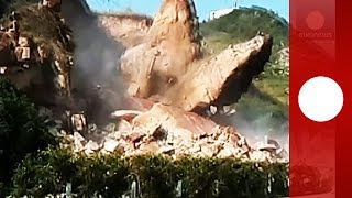 Caught on tape Huge rocks collapse fall on highway in China [upl. by Billi778]