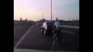 Motorcycle crash  rider lands on roof of car [upl. by Halludba646]