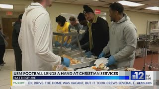 USM football players serve hot meals at Christian Services [upl. by Nawor]