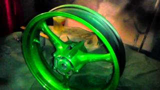 Painting kandy green on motorcycle wheels [upl. by Ahsitil]