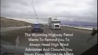 Wyoming wind gust blows semi truck on top of police car [upl. by Adyam]