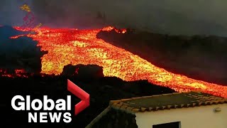 La Palma volcano Lava quottsunamiquot gushes down hillside after overflowing main cone [upl. by Mal]