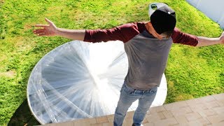 100 Layers Saran Wrap Trampoline LEAP OF FAITH [upl. by Stempson]