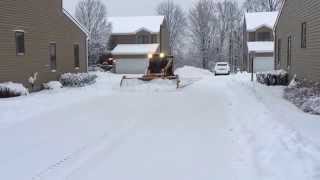 2015 Cat 272D pushing snow from Condo Driveways [upl. by Rog]