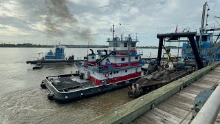 Tugboats work on the Mississippi River to move a dredge in New Orleans neworleans tugboats river [upl. by Diver]