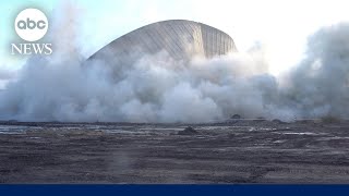 Controlled explosion brings down cooling tower in Germany [upl. by Casmey469]