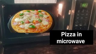 How to make pizza in microwave। microwave में pizza कैसे बनाएं।।food microwave cookingchannel [upl. by Neema]