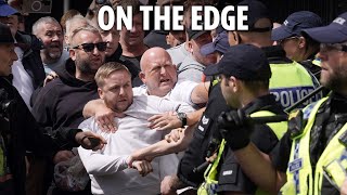 Punches thrown amp cops hurt as protests spread across UK amp Britain braces for MORE violence [upl. by Audrie687]