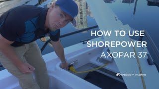 How to use Shore Power I Axopar 37 I Freedom Marine International Yacht Sales [upl. by Cullan]