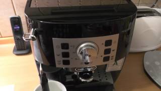 DeLonghi Magnifica S ECAM 22110 coffee maker unboxing and initial setup [upl. by Can686]