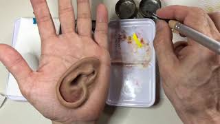 Staining on ear silicone prosthesis [upl. by Lertnom]