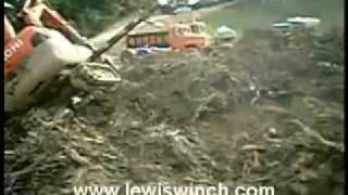 Lewis Winch uprights overturned backhoe with ease [upl. by Flossy302]