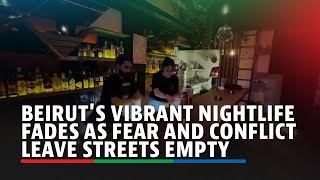 Beiruts vibrant nightlife fades as fear and conflict leave streets empty  ABSCBN News [upl. by Ellerd]