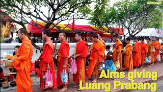 Laos traditional Alms giving ceremony Tak Bat at Luang Prabang [upl. by Irelav]