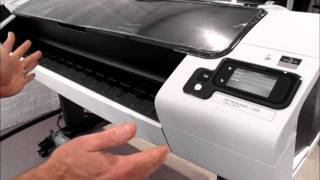 HP Designjet T1300 printer  how to load rolls of media [upl. by Halladba]