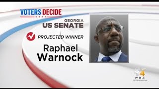 CBS News projects Raphael Warnock wins reelection in Georgia Senate race [upl. by Noramac]